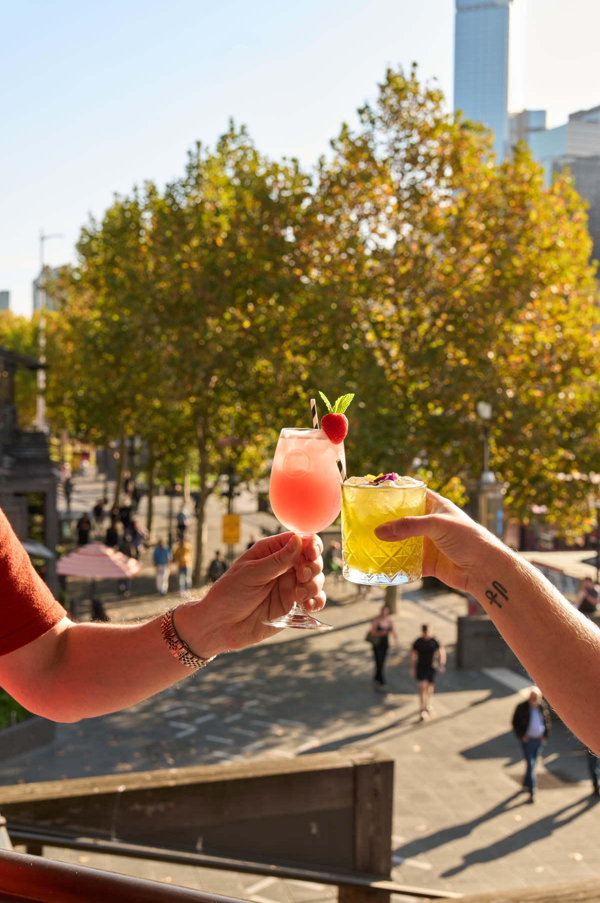 Two cocktails over Southbank at Yassas